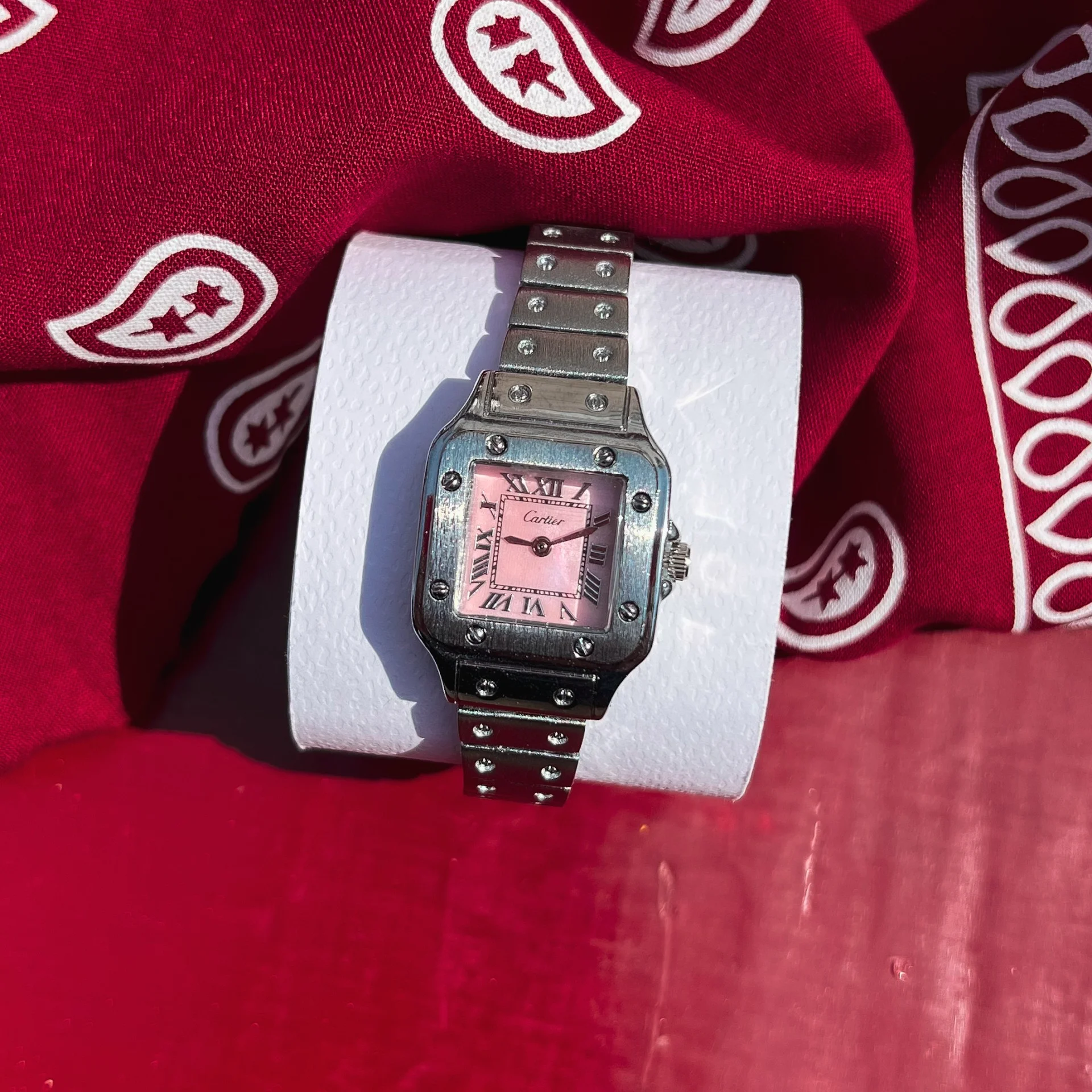 ساعت کارتیر صفحه صورتی
